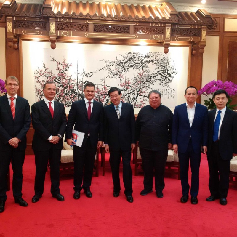 They were close business partners: Vuk Jeremic and Patrick Ho (third and fifth from left)